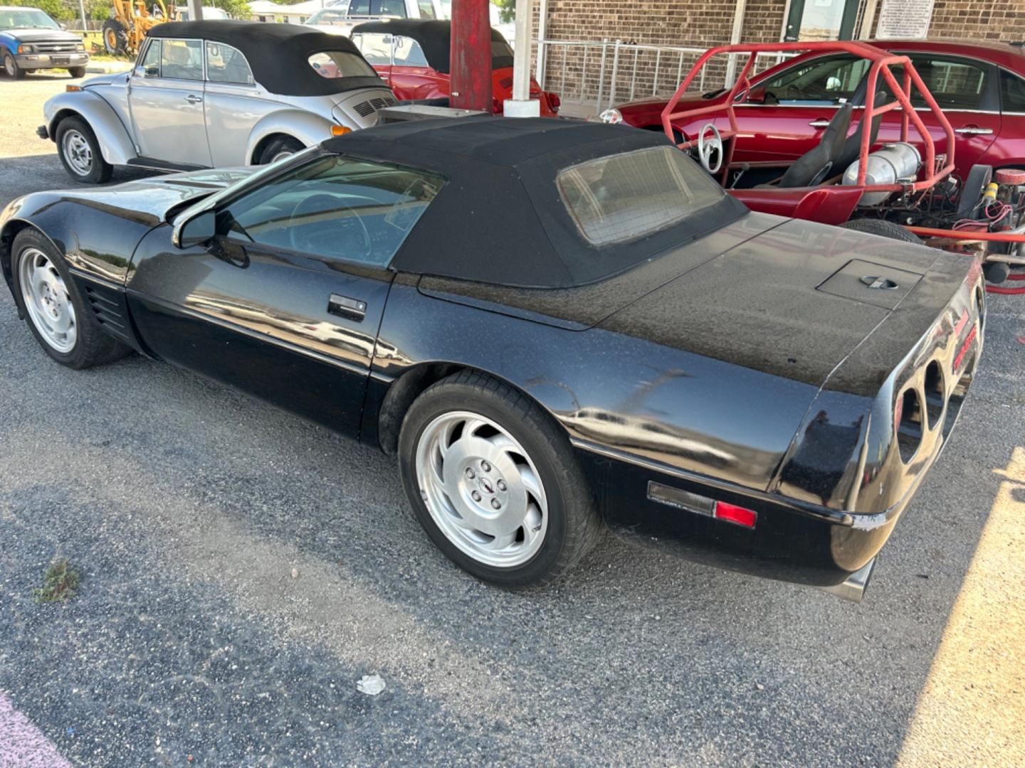 1994 Black /Black Chevrolet Corvette Convertible (1G1YY32P6R5) with an 5.7L V8 OHV 12V engine, 5SPD transmission, located at 1687 Business 35 S, New Braunfels, TX, 78130, (830) 625-7159, 29.655487, -98.051491 - Photo#6